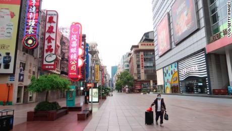 The nearly empty Nanjing Road pedestrian street is seen during the May Day holiday on May 1, 2022 in Shanghai, China. 