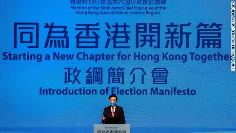 Hong Kongs former chief secretary John Lee introduces his election manifesto at an event in Hong Kong on April 29, 2022. (Photo by ISAAC LAWRENCE / AFP) (Photo by ISAAC LAWRENCE/AFP via Getty Images)
