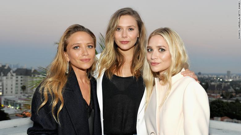Elizabeth Olsen says she was spoiled by sisters Mary-Kate and Ashley Olsen