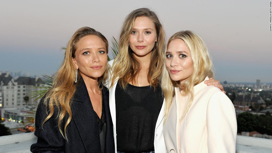 Elizabeth Olsen says she was spoiled by sisters Mary-Kate and Ashley Olsen