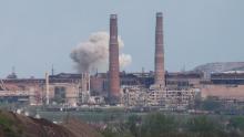 Smoke rises above a plant of Azovstal Iron and Steel Works during Ukraine-Russia conflict in the southern port city of Mariupol, Ukraine May 5, 2022.  