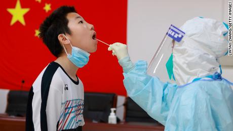 A boy undergoing a Covid test in Beijing, China on May 4.