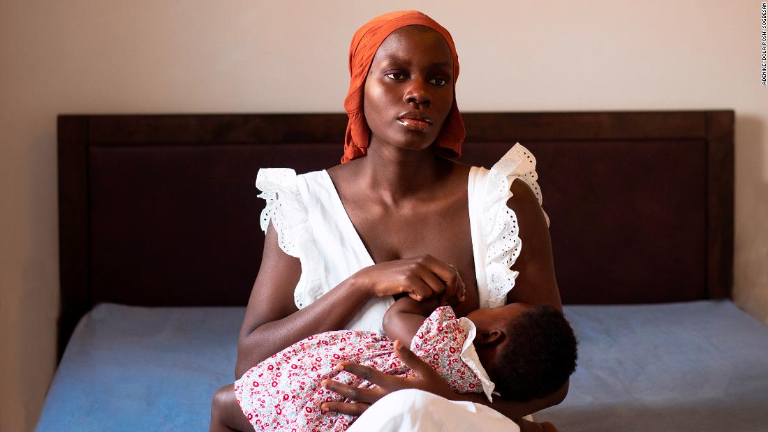&lt;a href=&quot;https://dolaposh.myportfolio.com/&quot; target=&quot;_blank&quot;&gt;Adenike Sogbesan&lt;/a&gt; took this self-portrait while breastfeeding her daughter, Monioluwa.&quot;In the beginning, motherhood was overwhelming,&quot; she said. &quot;All I did was care for my daughter. Neglecting myself and my health made me suffer from postpartum depression, but somehow I found the strength to seek help from professionals. They worked together to remind me of things that struck happiness. The answer was photography, personal care and nature. So I started making self-portraits. My biggest triumph is not having to let go of what I love: photography.&quot;