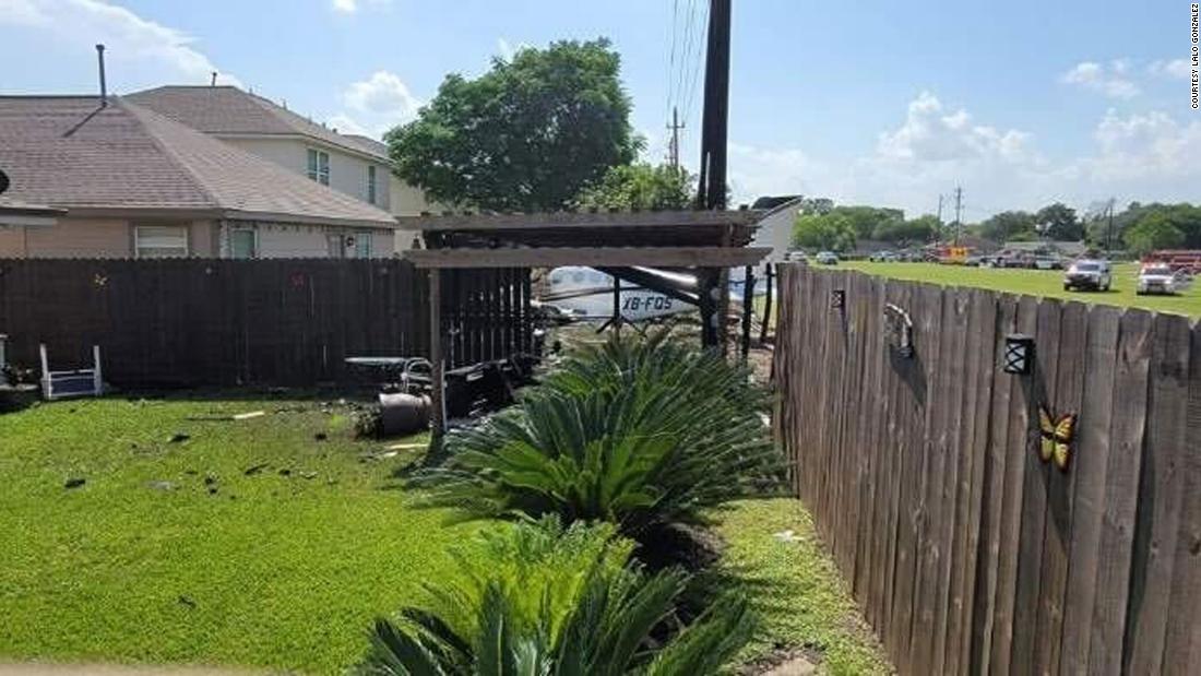 A small plane crashed into a backyard in Houston. All four people on board walked away