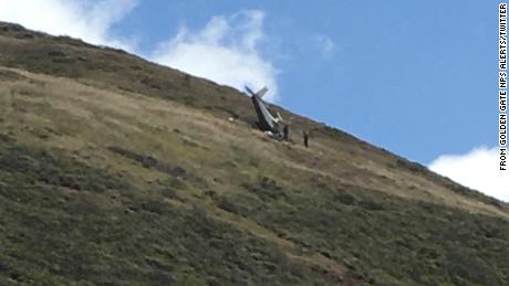 A plane carrying two people crashed into a hillside in the Marin Headlands near Slacker Hill on Friday, the Marin County Sheriff&#39;s Office said in a news release.