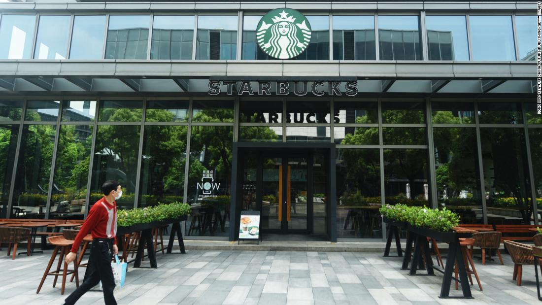 A pedestrian walking by a closed Starbucks outlet in Hangzhou in April.