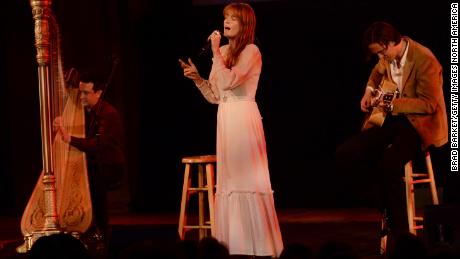 Florence Welch (center) performs with Florence + the Machine bandmates Tom Monger (left) and Robert Ackroyd (right) during The New Yorker Festival on October 11, 2019, in New York City. 