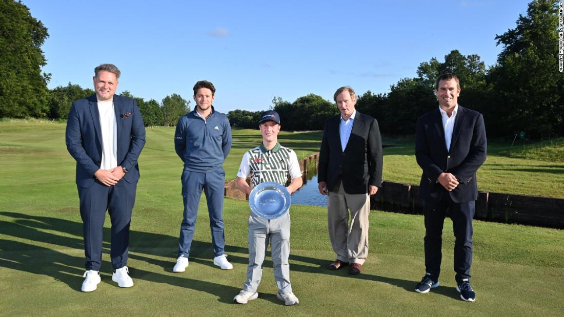 At Galgorm, Northern Ireland, in August 2021, Lawlor poses with the EDGA World Disability Invitational trophy, a win that moved Horan (center left) to tears. An advocate for disability golf, the former One Direction star is now a close friend of Lawlor&#39;s. 