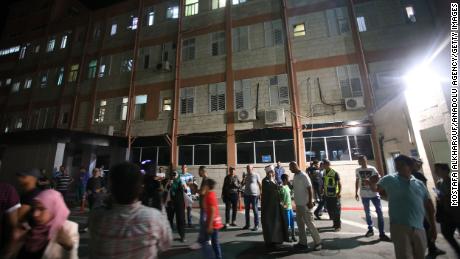 People gather in front of the Makassed Hospital on July 18, 2017.