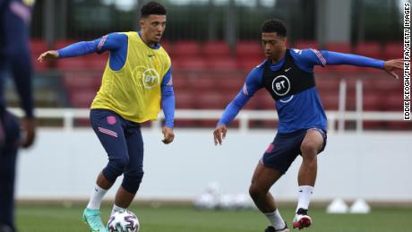 Jadon Sancho (left) and Jude Bellingham (right) of England in action during the England Training Session at St George&#39;s Park on June 14, 2021 in Burton upon Trent, England. 