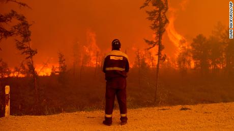 Forest fire near the village of Kuyorelyakh in Gorny Ulus in Russia, August 7, 2021.
