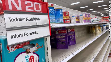 A baby formula display sits nearly empty at a Target store in Orlando.