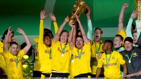 Haaland celebrates Dortmund&#39;s DFB Pokal final victory against RB Leipzig last year. 