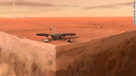 그림은 화성 표면 아래에 층이 있는 화성 표면에 앉아 있는 NASA의 InSight 착륙선을 보여줍니다.