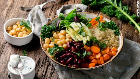 A quinoa and chickpea Buddha bowl can be a healthy alternative to ultra-processed foods.