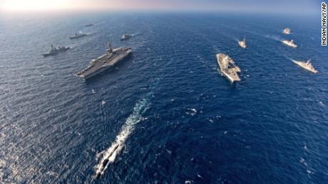 Aircraft carriers and warships participate in the Malabar naval exercises, attended by the US, Australia, India and Japan, in the Northern Arabian Sea on November 17, 2020. 