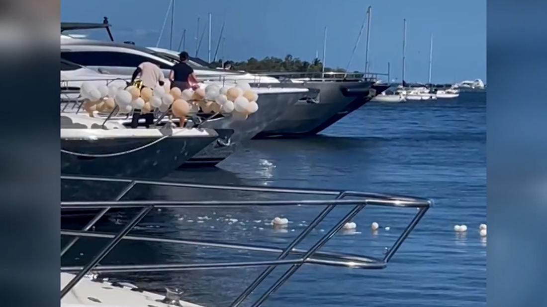 Controversial video shows boat crew members dumping balloons into marina – CNN Video