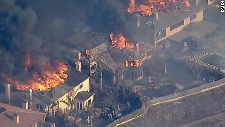 Multiple homes are ablaze in the area.