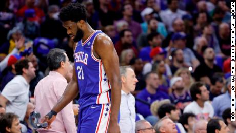 Embiid walks off the court after losing the Sixers&#39; series against the Miami Heat.