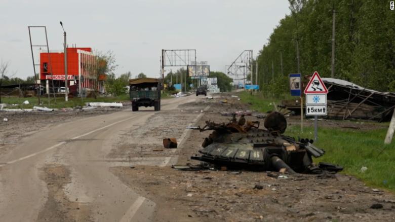 Bystanders help remove driver after colliding with military vehicle ...