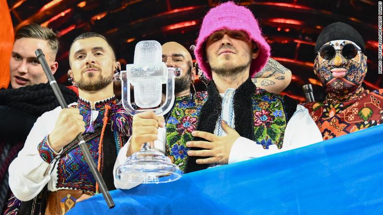 Members of Kalush Orchestra with the winner&#39;s trophy after winning the Eurovision Song contest 2022 on May 14 in Turin.