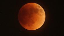 The Super Flower Blood Moon lunar eclipse occurs over Columbus, Ohio on May 15, 2022. May&#39;s full moon is known as the flower moon, and it temporarily turned red while it was in the earth&#39;s shadow.Super Flower Blood Moon Lunar Eclipse