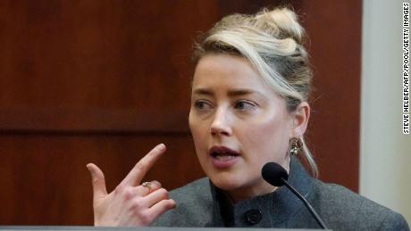 Actor Amber Heard testifies in the courtroom at the Fairfax County Circuit Courthouse in Fairfax, Virginia, on May 16, 2022. - Actor Johnny Depp sued his ex-wife Amber Heard for libel in Fairfax County Circuit Court after she wrote an op-ed piece in The Washington Post in 2018 referring to herself as a &quot;public figure representing domestic abuse.&quot;