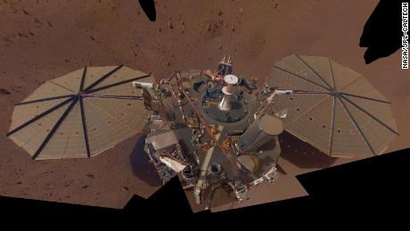     InSight's second full selfie, consisting of multiple images taken in March and April 2019, shows dust accumulating on solar panels.
