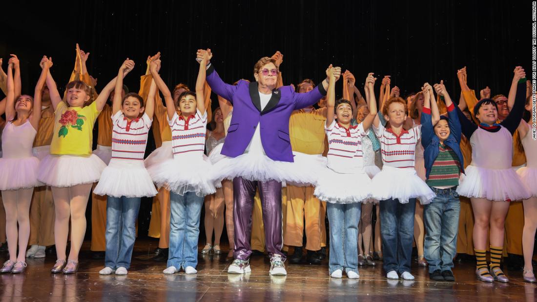 John makes a surprise curtain call appearance in Sydney as he visits the cast of &quot;Billy Elliot: The Musical&quot; in November 2019. John did the music for the production.