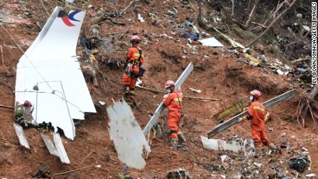 Rescuers conduct search and rescue work at a plane crash site in Tengxian County, south China&#39;s Guangxi Zhuang Autonomous Region, March 24, 2022.  Pieces of engine wreckage of the passenger plane that crashed in south China&#39;s Guangxi earlier this week have been found, an official told a press briefing on Thursday.  As of 4 p.m. Thursday, a total of 183 pieces of aircraft wreckage, some remains of victims and 21 pieces of belongings of victims have been found and handed over to the investigation team, Zheng said.    The plane with 132 aboard crashed on the afternoon of March 21 in a village in Guangxi&#39;s Tengxian County. No survivors have been found so far. One black box of the plane has been recovered. (Photo by Lu Boan/Xinhua via Getty Images)