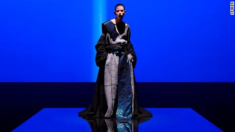 In 2021, fashion designer Yuima Nakazato presented a collection at Paris Fashion Week Haute Couture featuring a blue, glossy textile made from brewed protein fibers and silk.
