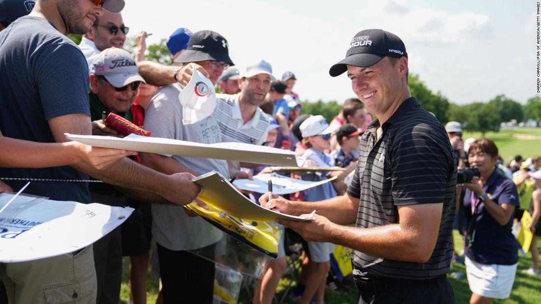 Jordan Spieth signs autographs during a practice round ahead of the 2022 PGA Championship.