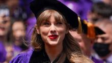 Taylor Swift participates in a graduation ceremony for New York University at Yankee Stadium in New York, Wednesday, May 18, 2022. (AP Photo/Seth Wenig)