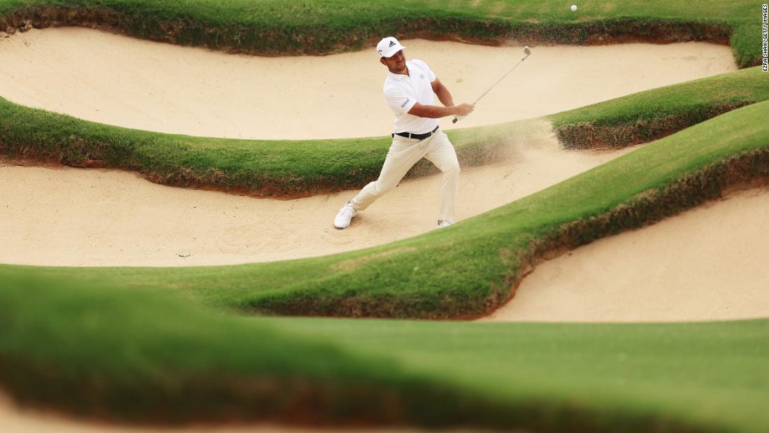 Xander Schauffele plays a shot from a bunker on the fifth hole during the second round.