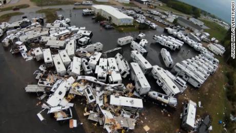 Camper trailers and RV&#39;s are seen tossed across a parking lot of a RV dealership following a deadly tornado in Gaylord, Michigan, Friday evening May 20, 2022.  (SevereStudios /Jordan Hall) MS 18273082