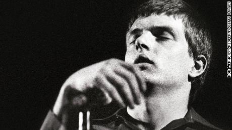 Joy Division frontman Ian Curtis performed on stage before his death in 1980.