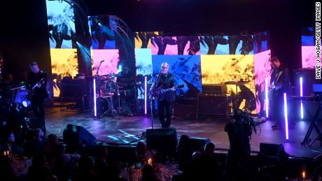 New Order performs on stage at the Music Industry Trust Awards in 2021.