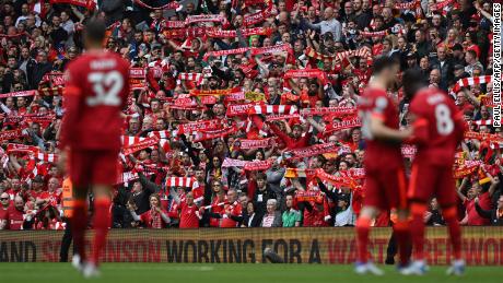 Liverpool&#39;s fans cheer their team on against Wolves.