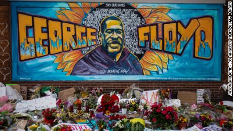 MINNEAPOLIS , MINNESOTA - MAY 31: The makeshift memorial and mural outside Cup Foods where George Floyd was murdered by a Minneapolis  police officer on May 25, 2020 in Minneapolis , Minnesota. (Jason Armond / Los Angeles Times via Getty Images)