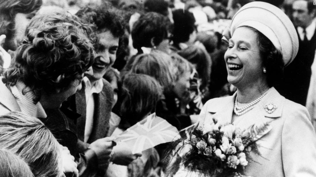 The Queen enjoys a laugh with two young well-wishers at St. Katherine&#39;s Dock, London during the final Silver Jubilee event -- a trip down the Thames river on June 9, 1977.