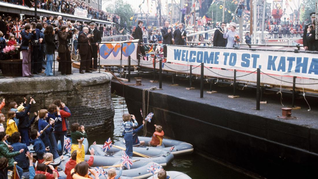The Queen is welcomed at St. Katharine&#39;s Dock near the Tower of London during her Silver Jubilee.