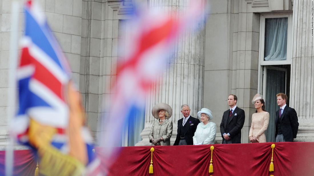 The Windsors gather on the Buckingham Palace balcony without Prince Philip, who was hospitalized for an infection a day earlier.