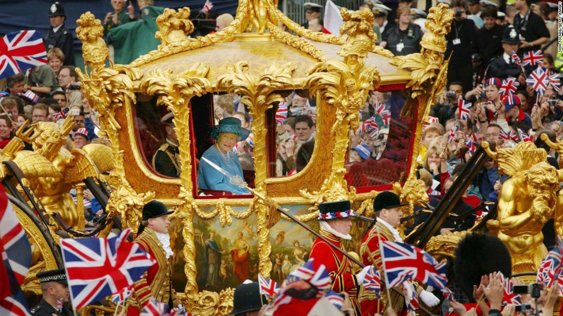 Royal-watchers young and old gather to catch a glimpse of the royal couple in the horse-drawn Gold State Coach, which was built in 1762. 
