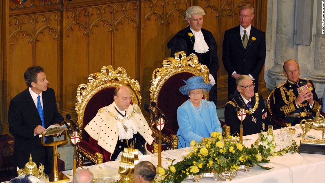 Britain&#39;s Prime Minister Tony Blair, left, delivers a speech praising the Queen&#39;s commitment to others and describes the &quot;huge affection&quot; in which the nation holds her during a celebratory lunch at the Guildhall on June 4, 2002.