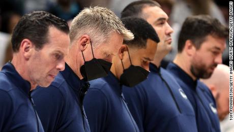 Kerr observes a moment of silence after Tuesday's mass shooting.