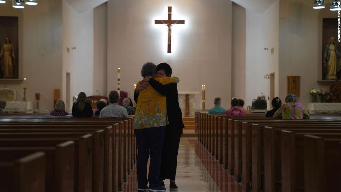 People attend Mass at the Sacred Heart Catholic Church in Uvalde on May 25.