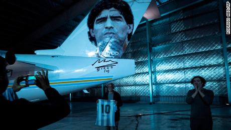 The aircraft, owned by a local business group, will carry and display jerseys and other objects that belonged to Maradona.