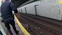 Video: Police rescue blind man on train track 