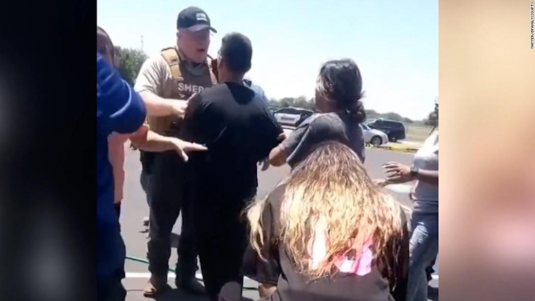 Watch: Parents seen frustrated with police at shooting scene in new video