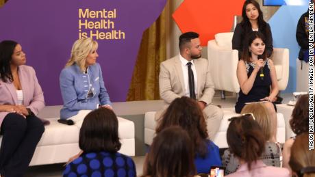 Jill Biden and Selena Gomez appear on stage when MTV Entertainment hosts the world's first ever mental health forum at the White House on May 18, 2022.